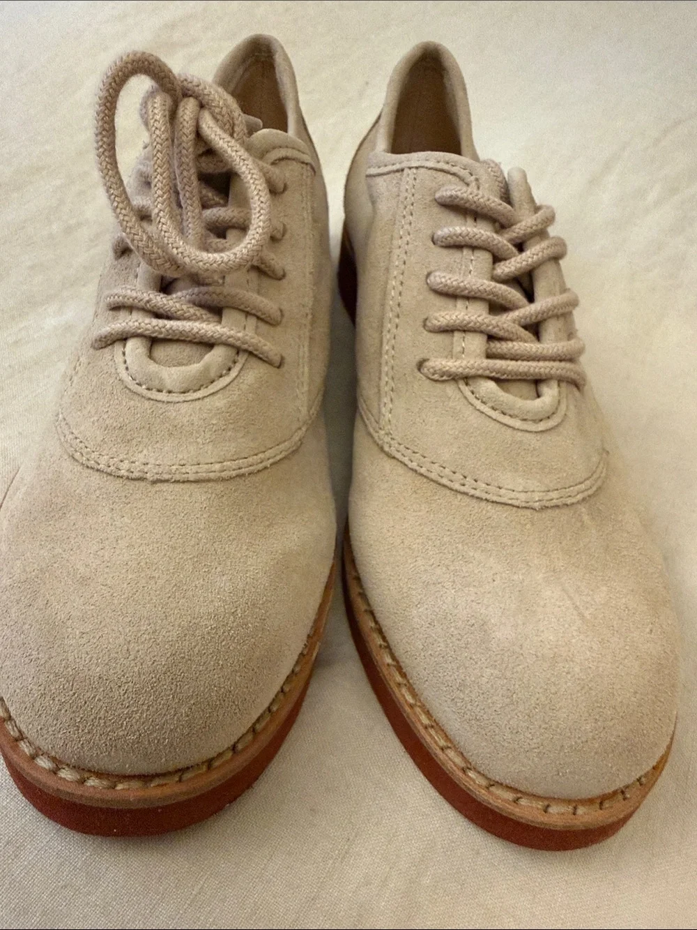 Beige Suede Lace-Up loafers.